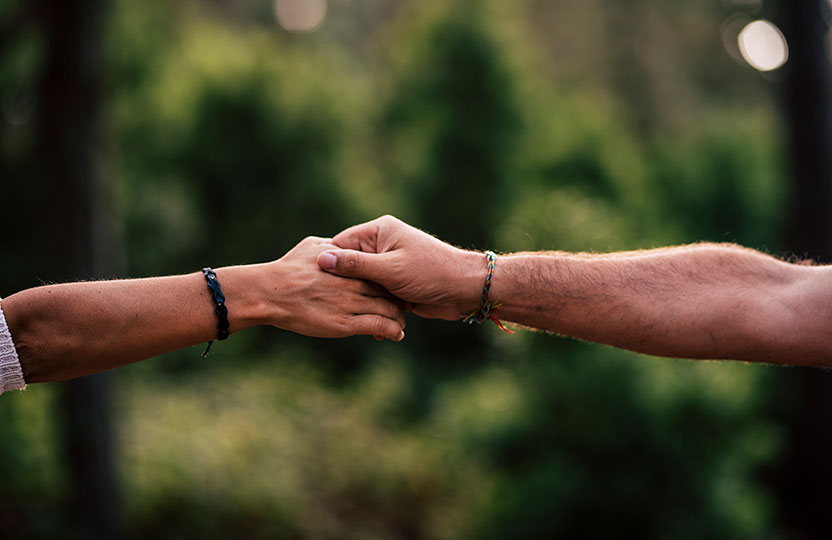 reaching out hands